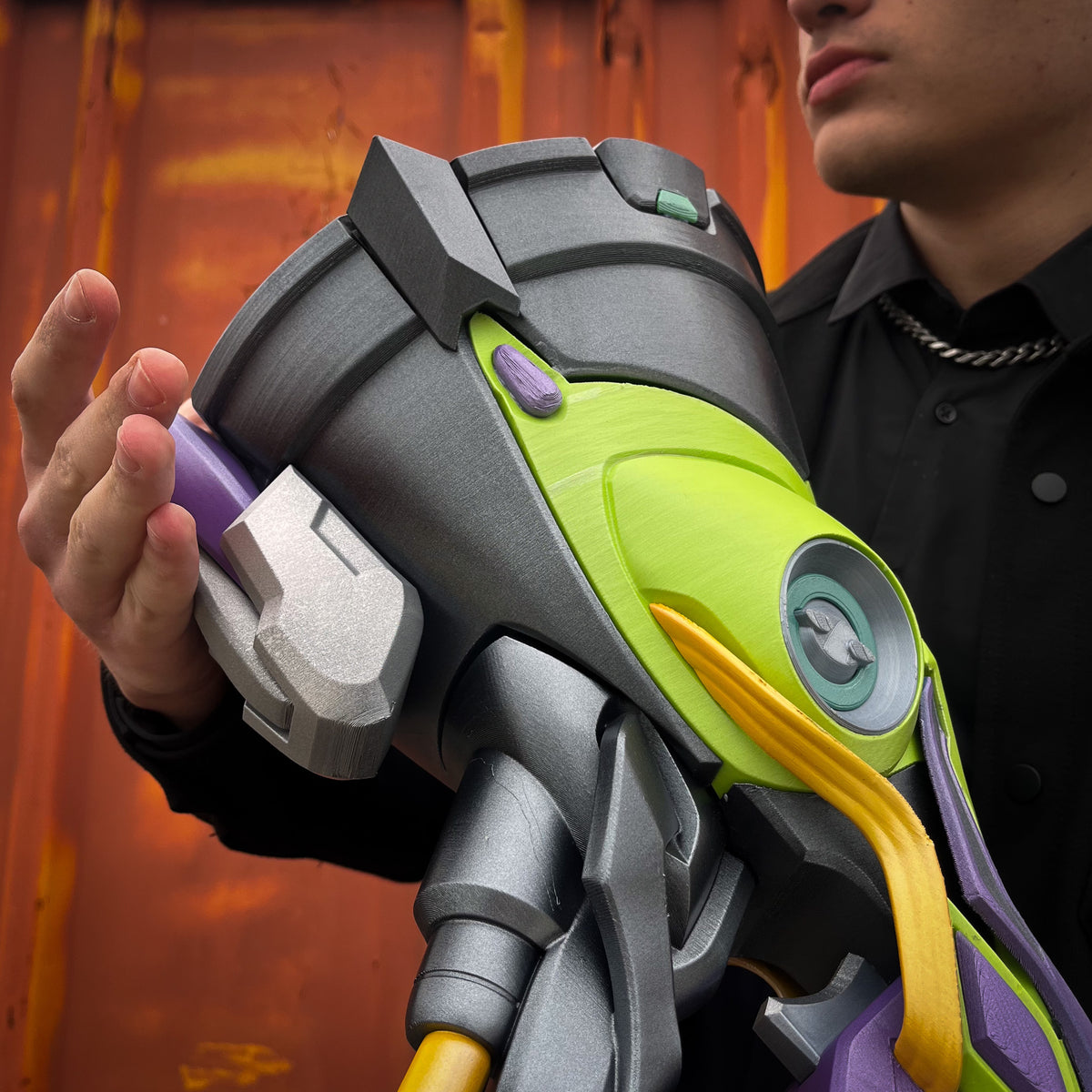 finished Lúcio Sonic Amplifier-inspired 3D printed cosplay prop photographed from another angle