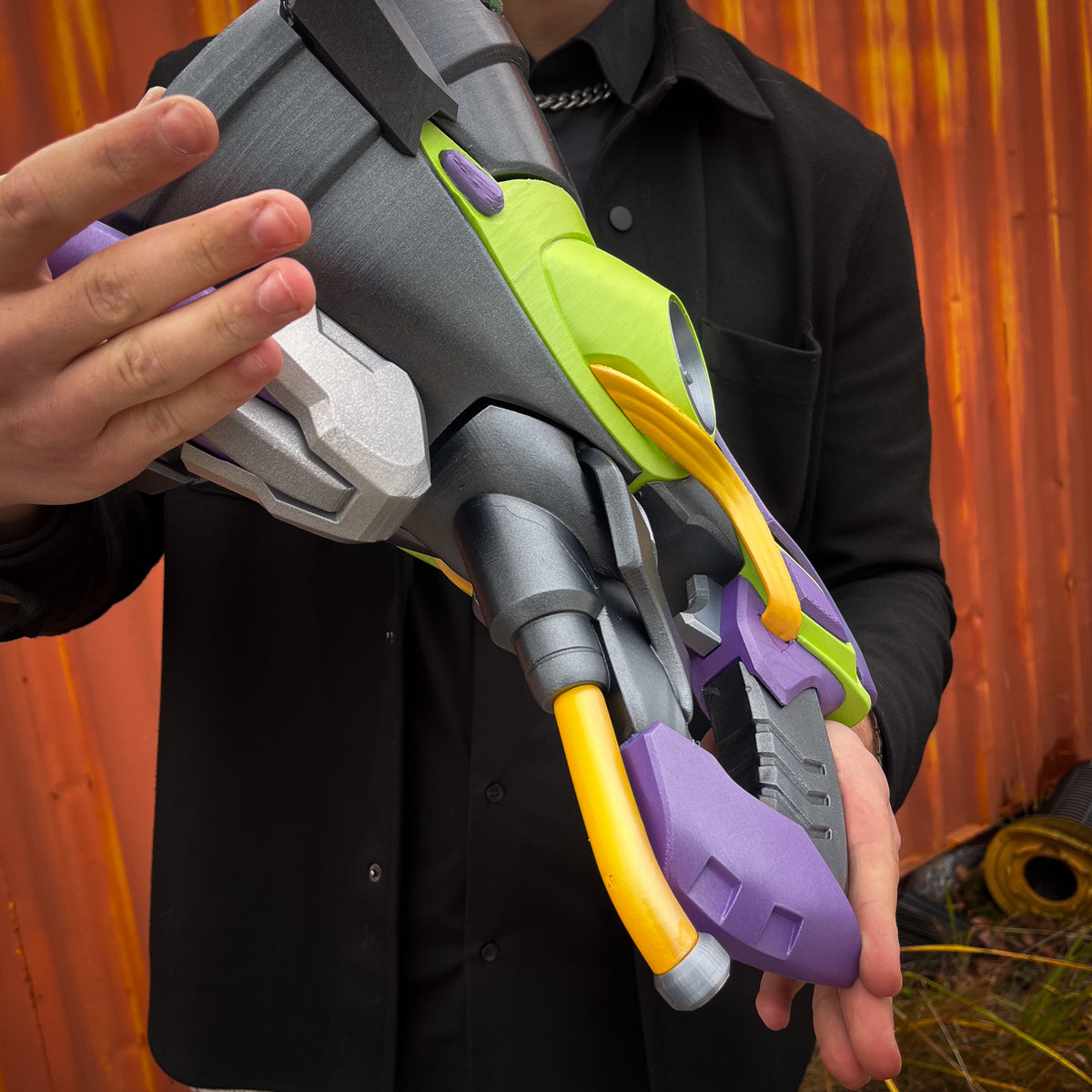 finished Lúcio Sonic Amplifier-inspired 3D printed cosplay prop photographed from another angle