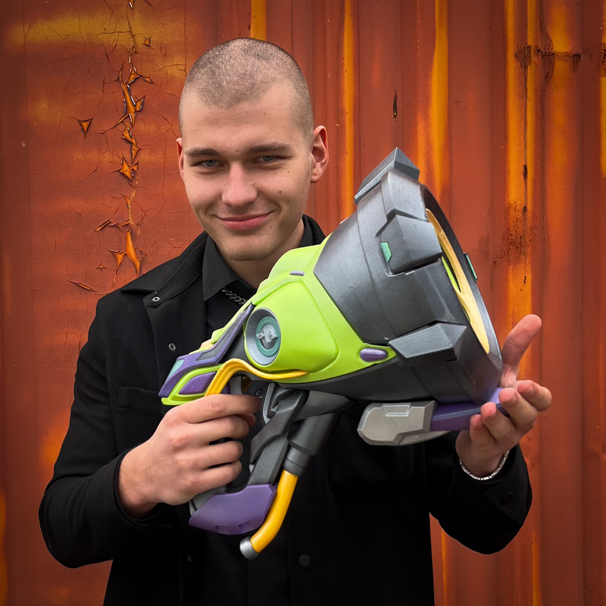 finished Lúcio Sonic Amplifier-inspired 3D printed cosplay prop photographed from another angle