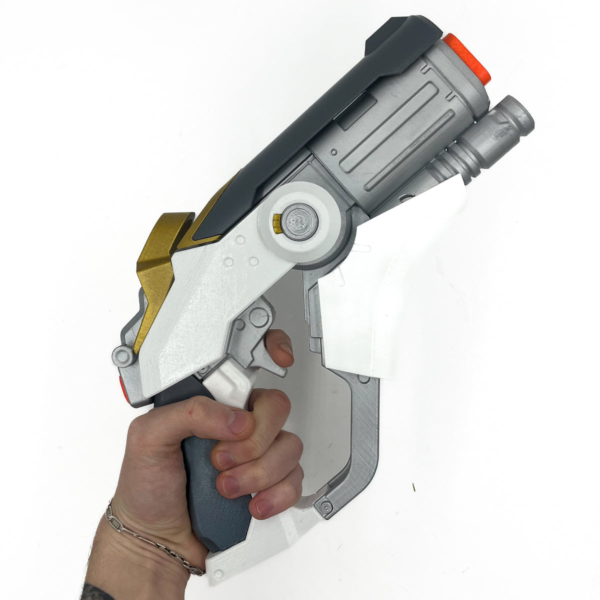 finished Mercy Caduceus Blaster-inspired Overwatch 1 3D printed cosplay prop photographed from another angle