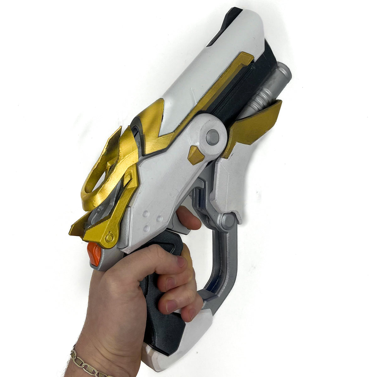 Full view of finished Mercy Caduceus Blaster-inspired Overwatch 2 3D printed cosplay prop photographed from another angle