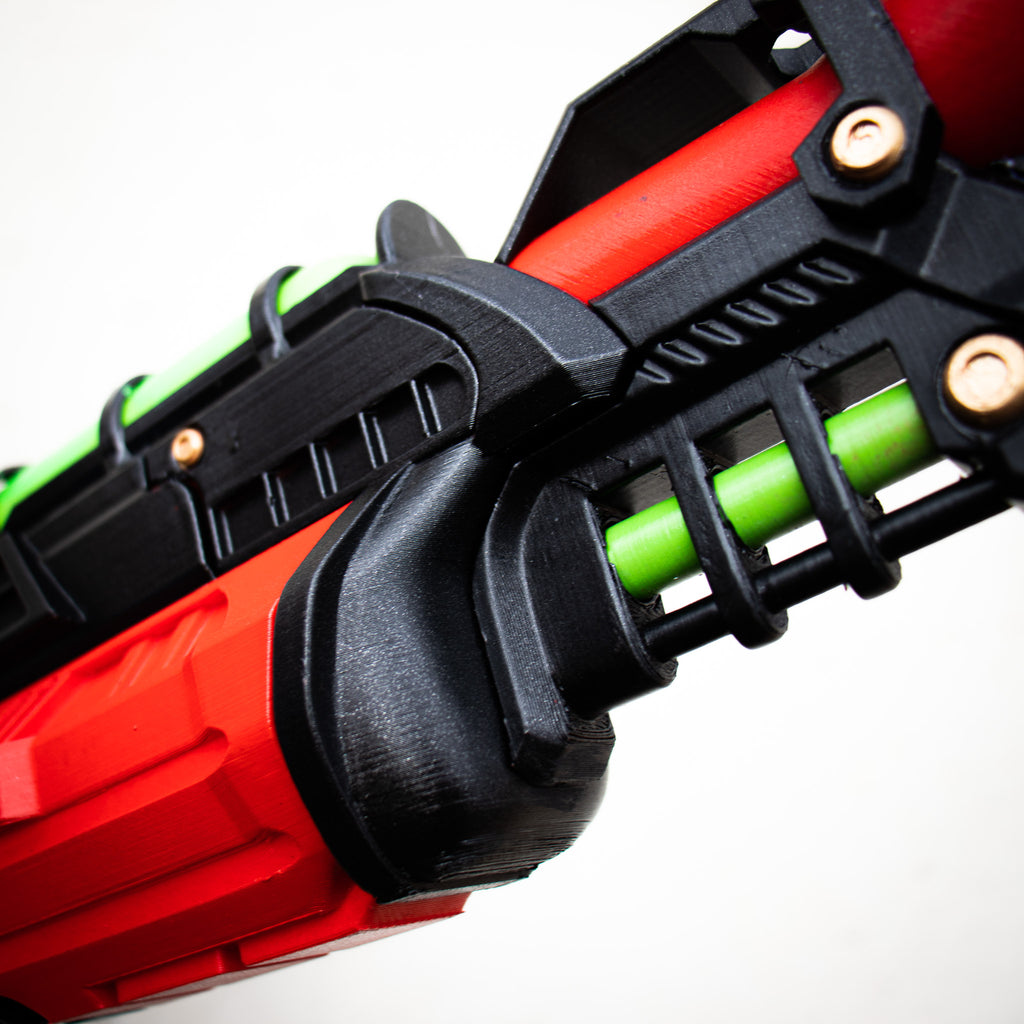 Close-up of the green tube and black frame details on the 3D printed prop