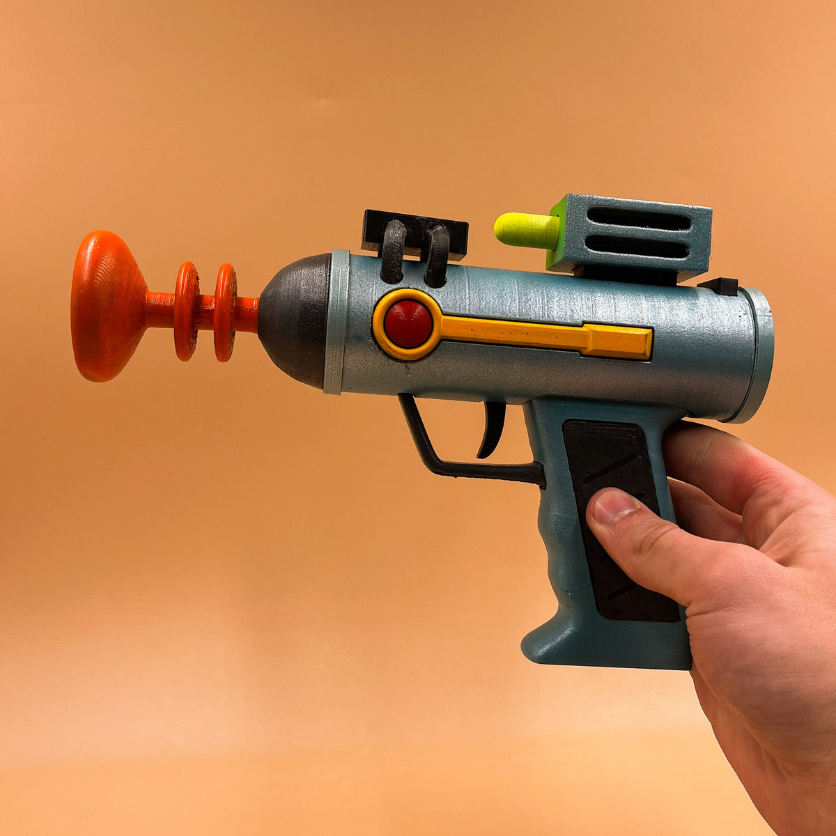 Hand-held scale view of the 3D printed sci-fi laser gun
