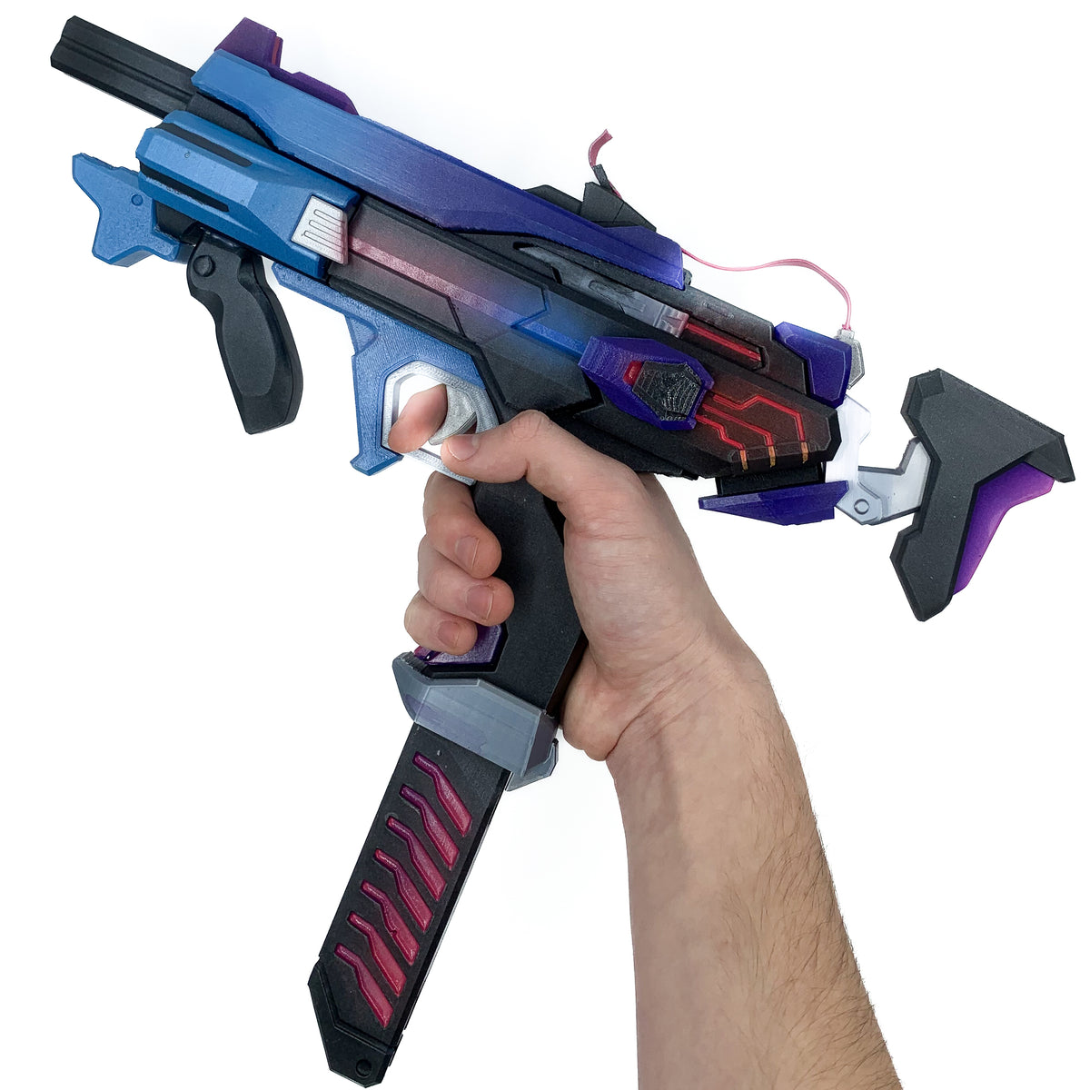 finished Sombra Machine Pistol-inspired 3D printed cosplay prop photographed from another angle