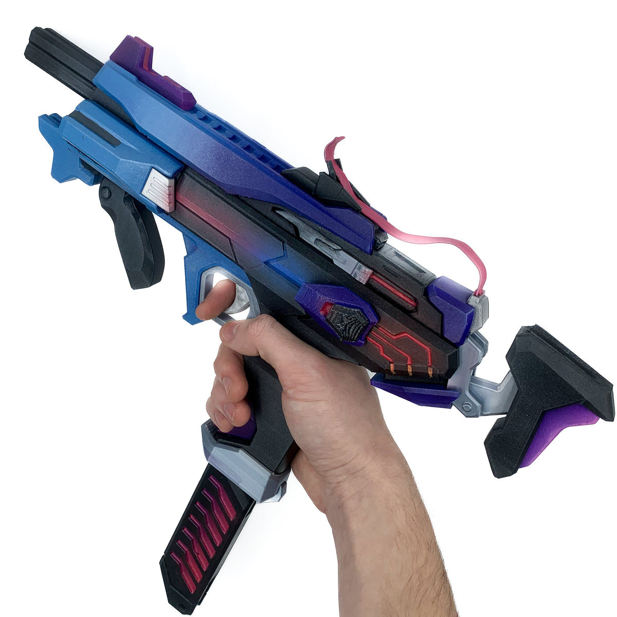 finished Sombra Machine Pistol-inspired 3D printed cosplay prop photographed from another angle
