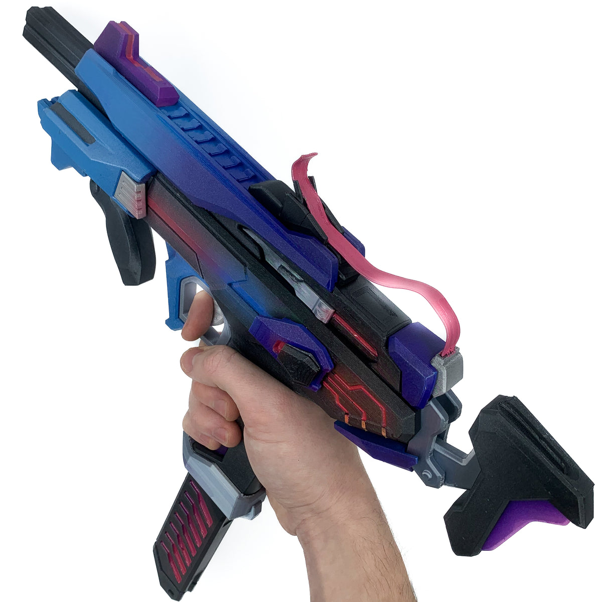 finished Sombra Machine Pistol-inspired 3D printed cosplay prop photographed from another angle