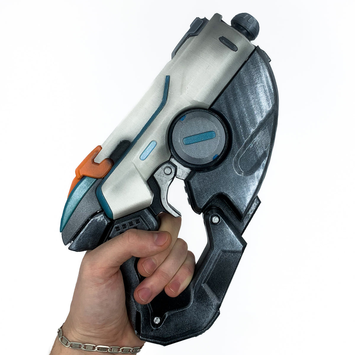 Full view of finished Tracer Pulse Pistol-inspired 3D printed cosplay prop photographed from another angle