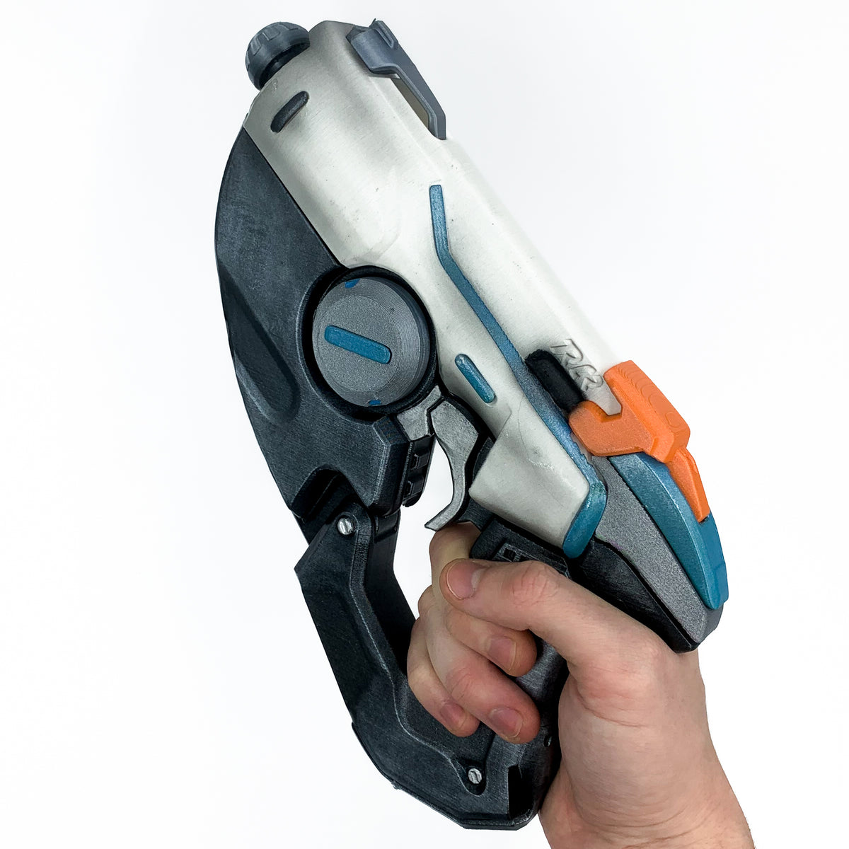 finished Tracer Pulse Pistol-inspired 3D printed cosplay prop photographed from another angle