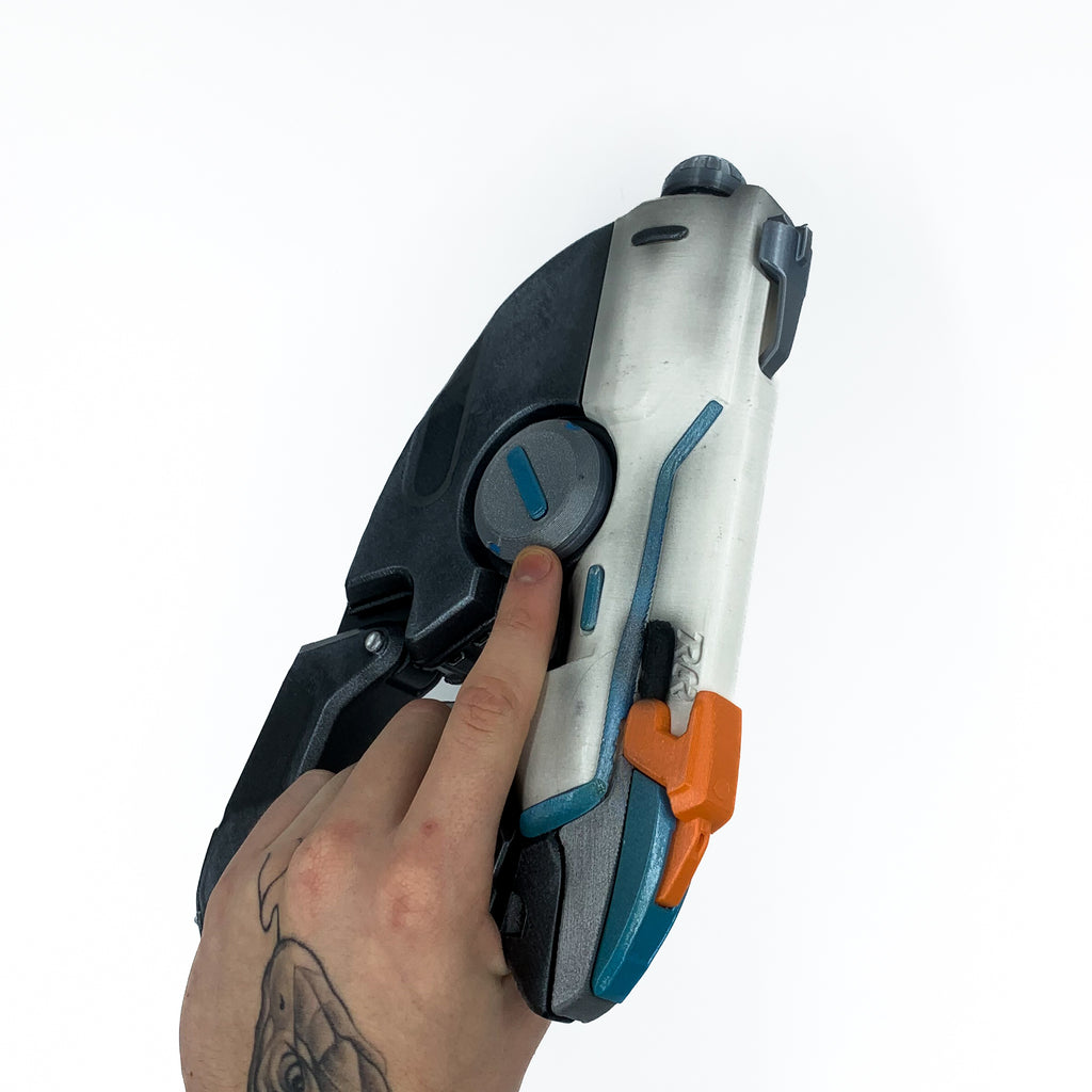 finished Tracer Pulse Pistol-inspired 3D printed cosplay prop photographed from another angle