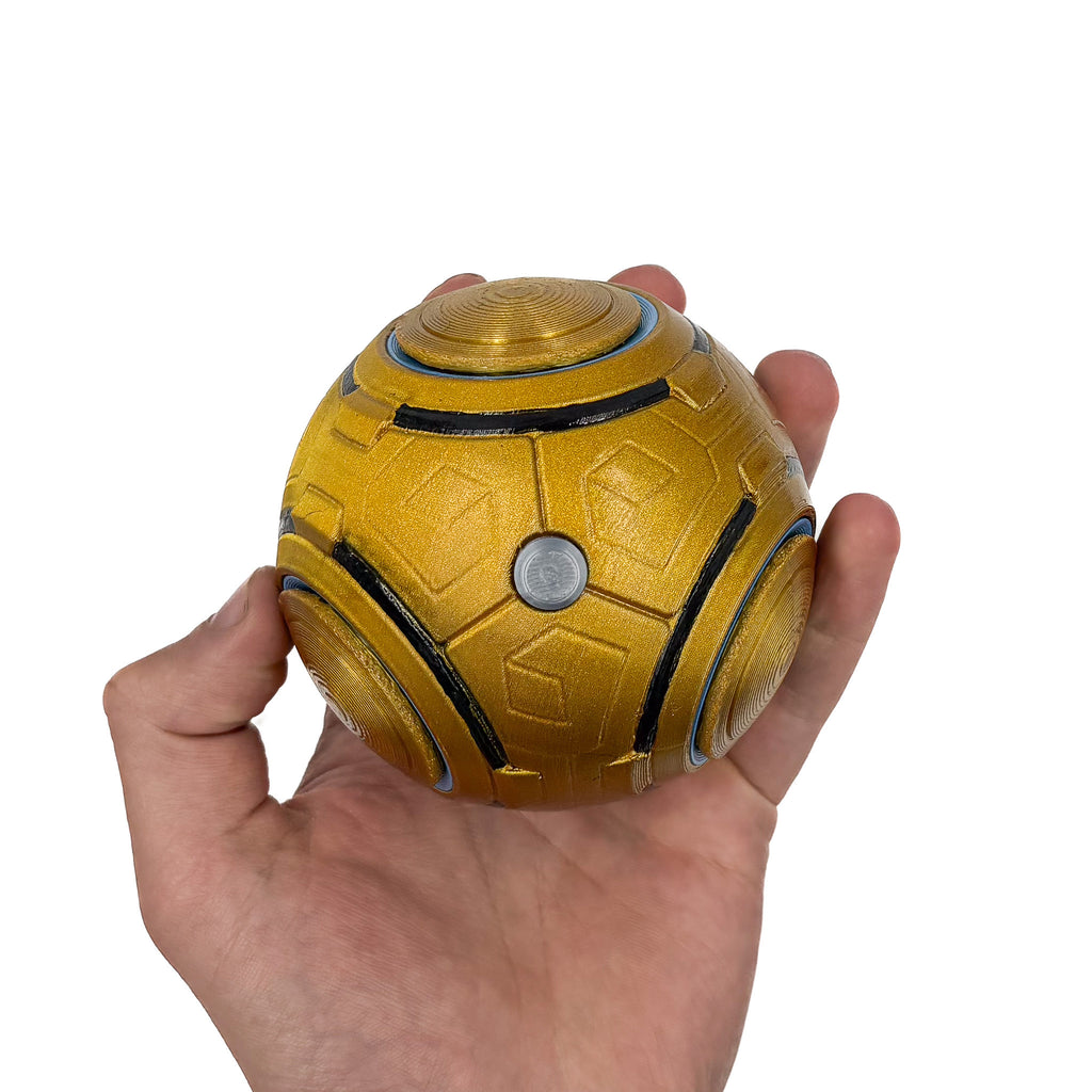Finished 3D printed Zenyatta Orb of Destruction cosplay prop in gold, black and blue